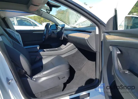 2023 Tesla Model Y Awd/Long Range Dual Motor All-Wheel Drive z USA, uszkodzony, nr VIN 7SAYGDEE9PA052958